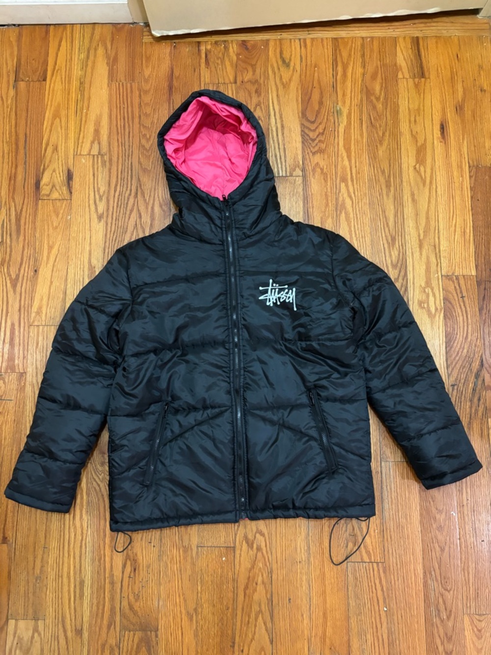 Stüssy Black Puffer Jacket with Pink Lined Hood